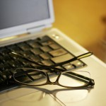 laptop and reading glasses